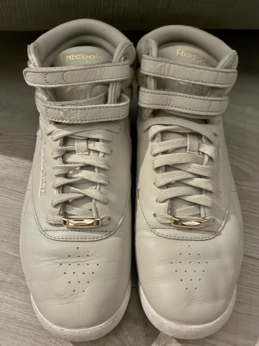 Reebok Woman’s FreeStyle Hi Muted “Sandstone”Hi Top Sneakers
